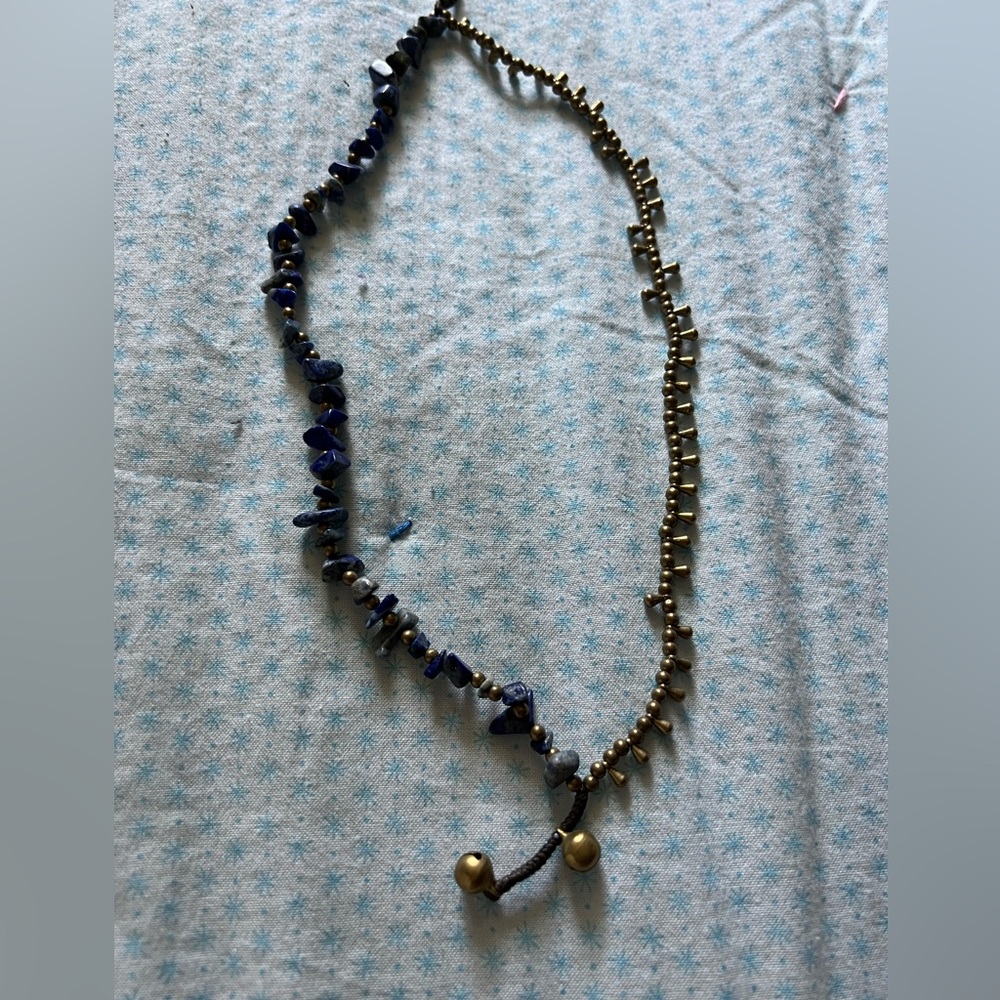 Women’s blue and Pearl beaded necklace.